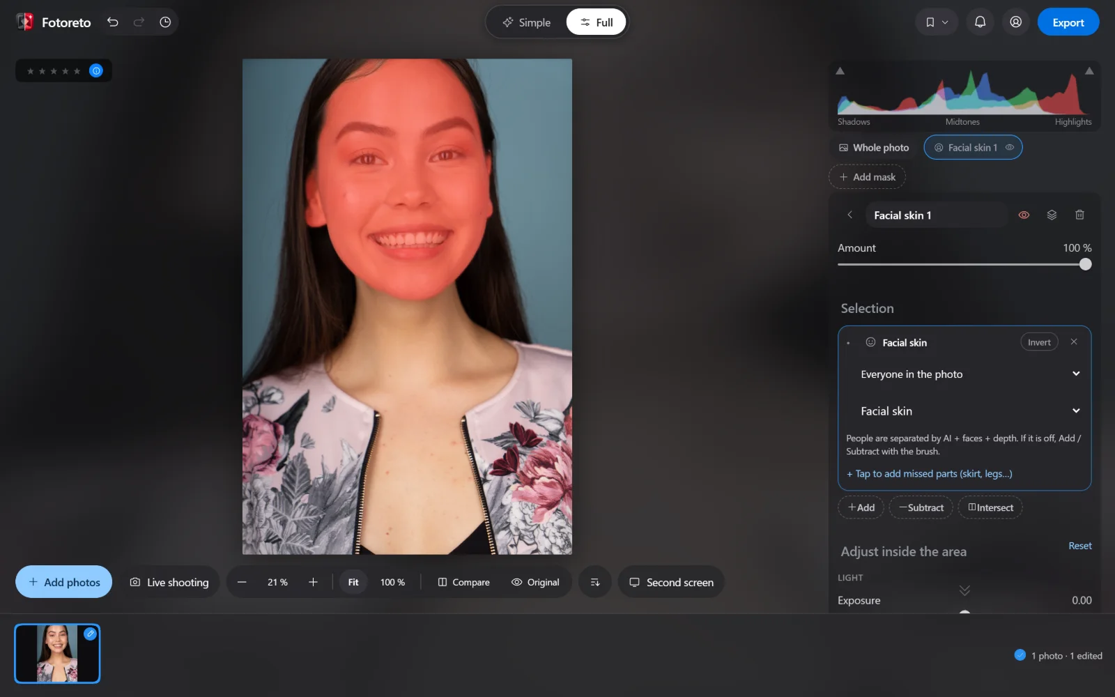 The Facial skin mask in Fotoreto: the model's facial skin selected by the app and shown in red, with the in-mask sliders on the right
